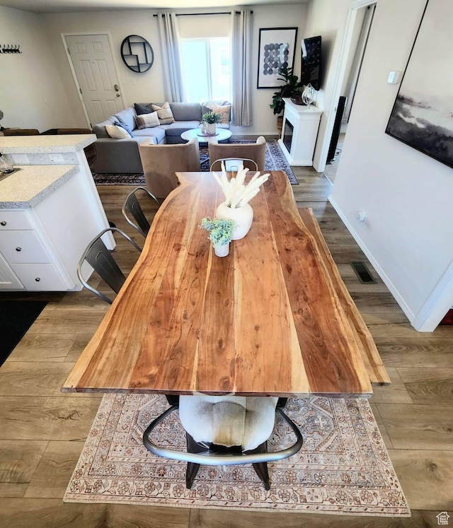 573 S Aspen Dr, Garden City, UT 84028 - dining room with dark hardwood / wood-style flooring