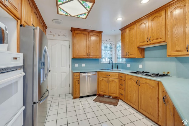1402 Shepherd Dr, Wellington, UT 84542 - kitchen with sink, light tile patterned floors, and stainless steel appliances