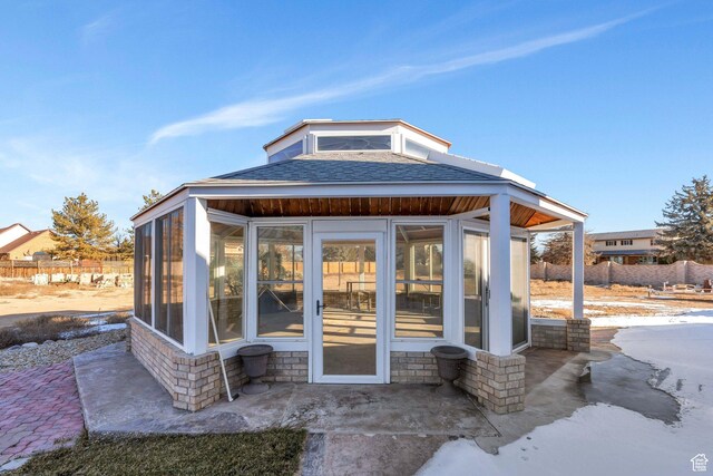 1402 Shepherd Dr, Wellington, UT 84542 - view of outdoor structure featuring a sunroom