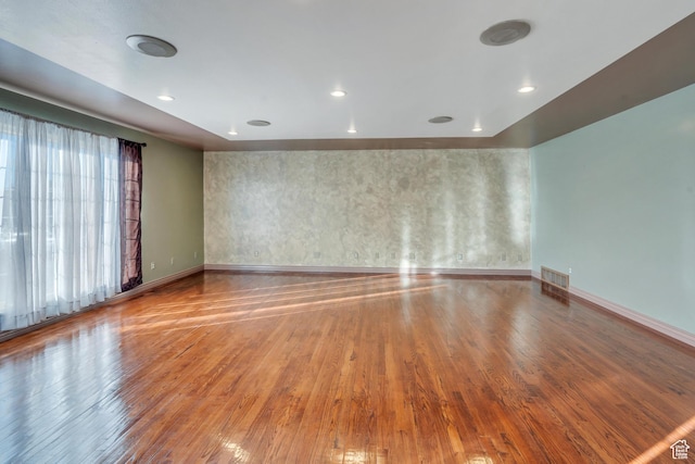 1402 Shepherd Dr, Wellington, UT 84542 - unfurnished room featuring hardwood / wood-style flooring