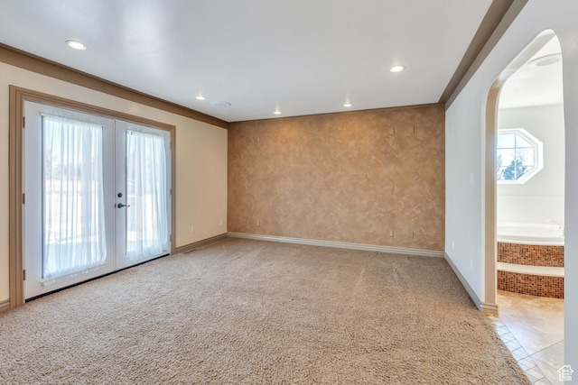 1402 Shepherd Dr, Wellington, UT 84542 - tiled spare room with french doors