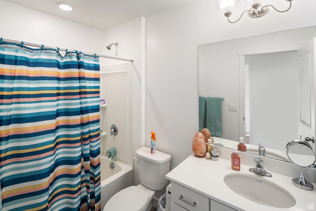 full bathroom featuring vanity, toilet, and shower / bathtub combination with curtain