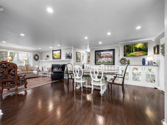 208 S 1100 E, Payson, UT 84651 - dining space featuring ornamental molding, a fireplace, recessed lighting, and wood finished floors