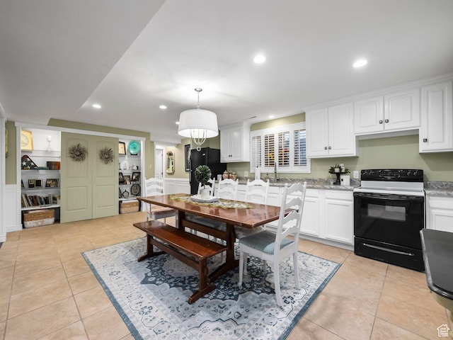 208 S 1100 E, Payson, UT 84651 - dining room featuring light tile patterned flooring, recessed lighting, and wainscoting