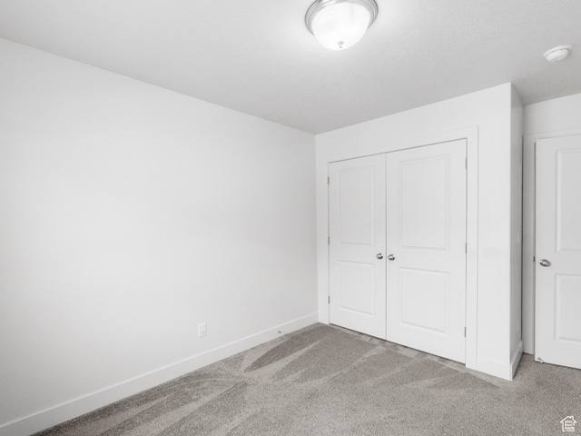 364 S 1580 E, Hyrum, UT 84319 - unfurnished bedroom featuring carpet floors and a closet