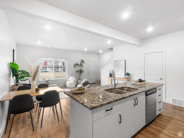 364 S 1580 E, Hyrum, UT 84319 - kitchen with dishwasher, sink, an island with sink, light hardwood / wood-style floors, and white cabinets
