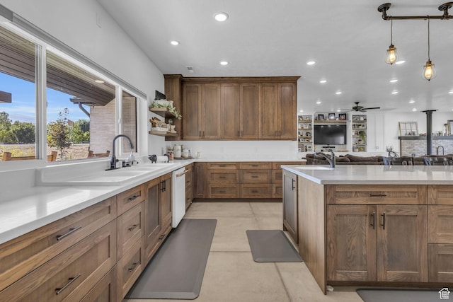30 W 400 N, Fillmore, UT 84631 - kitchen featuring ceiling fan, sink, white dishwasher, and decorative light fixtures