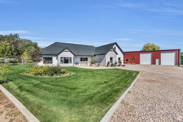 30 W 400 N, Fillmore, UT 84631 - view of front of property with a garage, an outbuilding, and a front yard