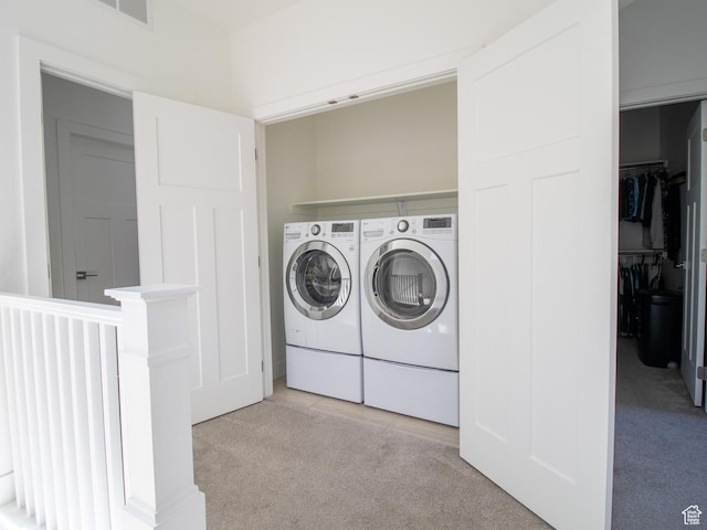 1418 E Komenda Way, Millcreek, UT 84124 - clothes washing area featuring washer and dryer and light carpet