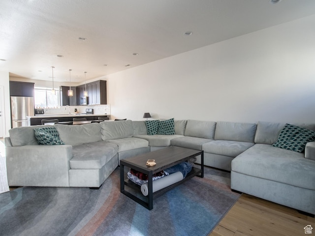 1418 E Komenda Way, Millcreek, UT 84124 - living room featuring dark hardwood / wood-style floors and sink
