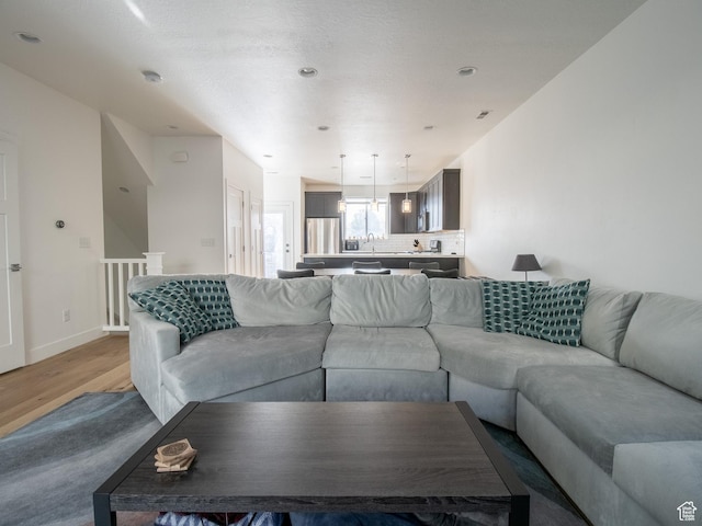1418 E Komenda Way, Millcreek, UT 84124 - living room featuring sink and hardwood / wood-style flooring