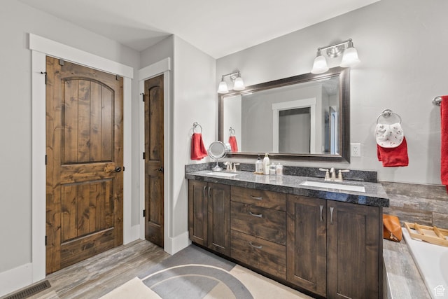 13579 N Hillclimb Ln, Kamas, UT 84036 - bathroom with hardwood / wood-style flooring and vanity