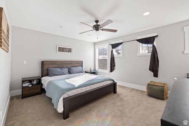 13579 N Hillclimb Ln, Kamas, UT 84036 - bedroom featuring multiple windows, ceiling fan, and light colored carpet