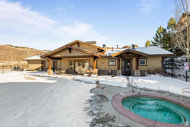 13579 N Hillclimb Ln, Kamas, UT 84036 - snow covered rear of property with a hot tub