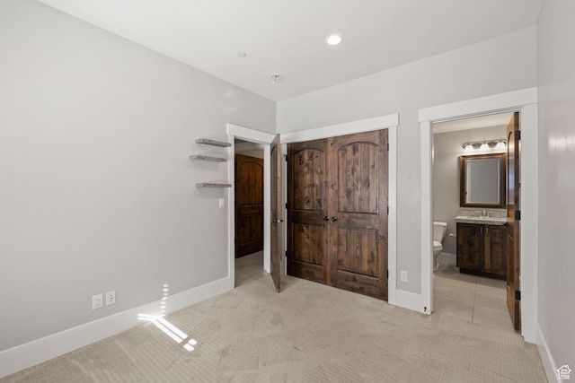 13579 N Hillclimb Ln, Kamas, UT 84036 - unfurnished bedroom featuring connected bathroom and light colored carpet