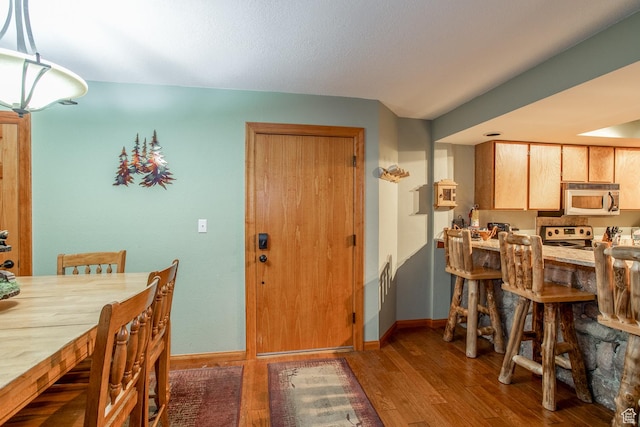 407 S Vasels Rd Unit 65, Brian Head, UT 84719 - dining area with hardwood / wood-style floors
