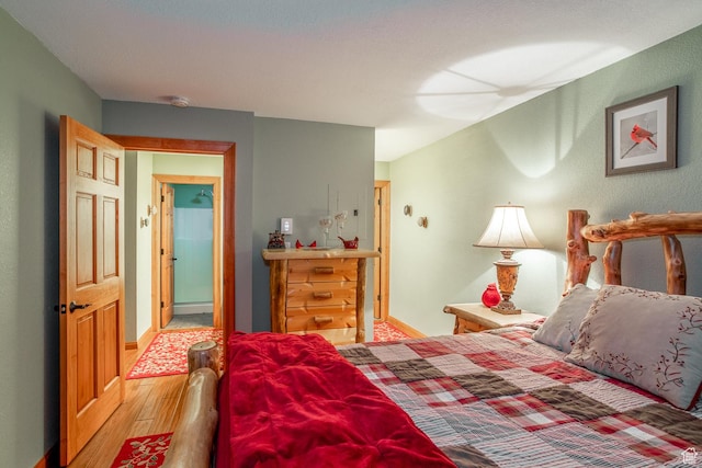 407 S Vasels Rd Unit 65, Brian Head, UT 84719 - bedroom featuring light hardwood / wood-style floors
