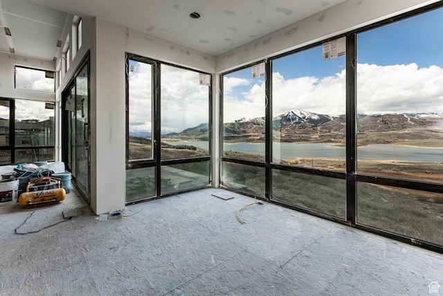 688 E Longview Dr, Hideout, UT 84036 - unfurnished sunroom featuring a water and mountain view and plenty of natural light