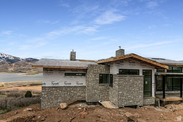 688 E Longview Dr, Hideout, UT 84036 - back of property with a chimney and stone siding