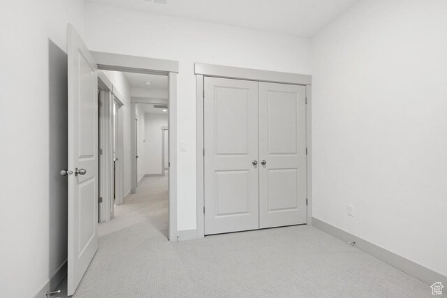 11423 S Watercourse Rd, South Jordan, UT 84009 - unfurnished bedroom featuring carpet floors, a closet, and baseboards