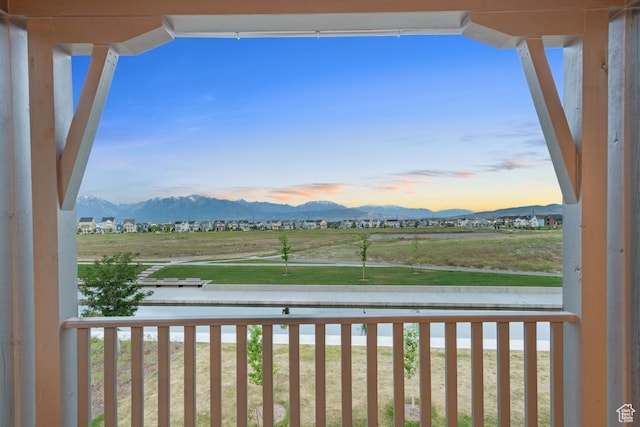 11423 S Watercourse Rd, South Jordan, UT 84009 - balcony at dusk with a mountain view
