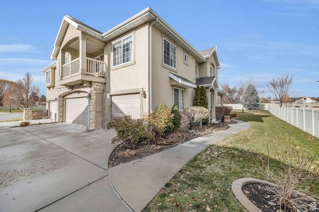 67 S 930 E, American Fork, UT 84003 - view of side of property featuring a lawn, a balcony, and a garage