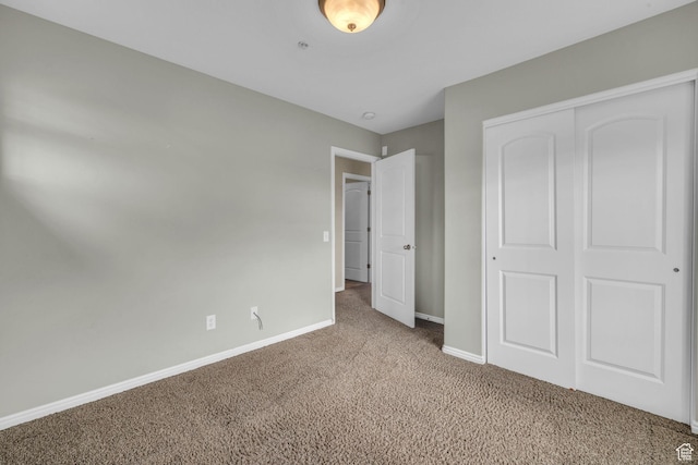 67 S 930 E, American Fork, UT 84003 - unfurnished bedroom featuring a closet and light colored carpet