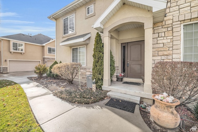 entrance to property featuring a garage
