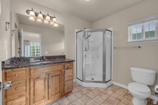 67 S 930 E, American Fork, UT 84003 - bathroom featuring vanity, toilet, walk in shower, and a healthy amount of sunlight