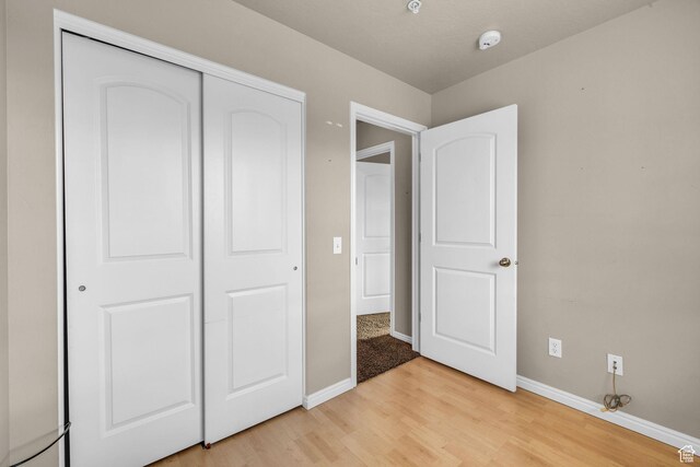 67 S 930 E, American Fork, UT 84003 - unfurnished bedroom featuring light wood-type flooring and a closet