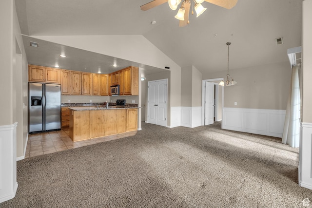 67 S 930 E, American Fork, UT 84003 - kitchen featuring pendant lighting, light colored carpet, vaulted ceiling, ceiling fan with notable chandelier, and appliances with stainless steel finishes