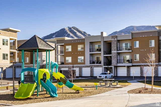 community play area with a mountain view