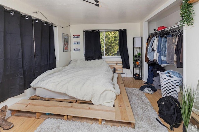 138 Crockett Ave, Logan, UT 84321 - bedroom featuring hardwood / wood-style floors