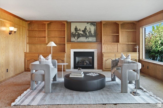 1375 E 260 N, Logan, UT 84321 - living room with light carpet, built in shelves, ornamental molding, and wooden walls