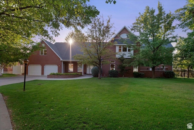 1375 E 260 N, Logan, UT 84321 - view of front of property featuring a garage and a yard