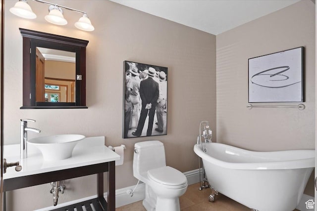 1375 E 260 N, Logan, UT 84321 - bathroom with tile patterned floors, sink, a washtub, and toilet