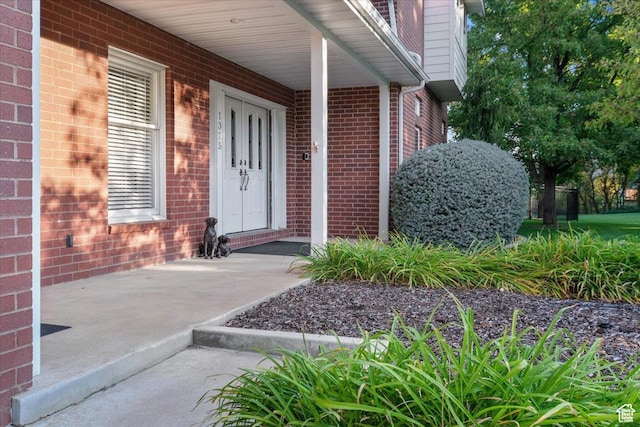 1375 E 260 N, Logan, UT 84321 - doorway to property featuring covered porch