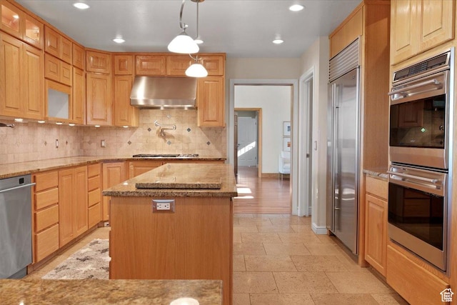 1375 E 260 N, Logan, UT 84321 - kitchen featuring light stone countertops, hanging light fixtures, stainless steel appliances, ventilation hood, and a kitchen island