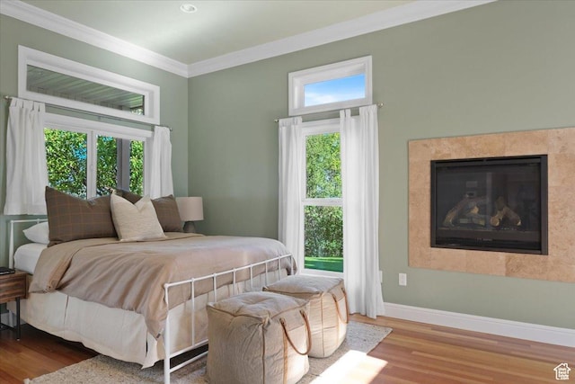 1375 E 260 N, Logan, UT 84321 - bedroom with multiple windows, crown molding, and hardwood / wood-style floors