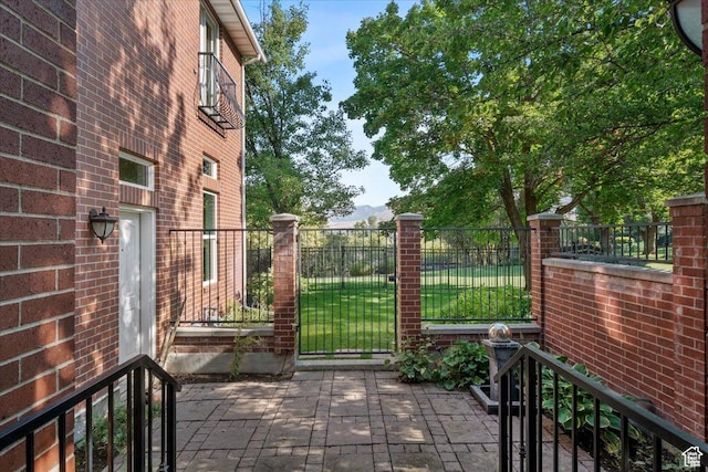 1375 E 260 N, Logan, UT 84321 - view of gate featuring a yard and a patio