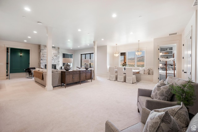 6736 E Via Cortina, Huntsville, UT 84317 - living room with a stone fireplace and light colored carpet