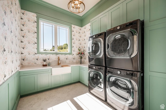 6736 E Via Cortina, Huntsville, UT 84317 - washroom featuring cabinets, sink, crown molding, stacked washer / drying machine, and a chandelier