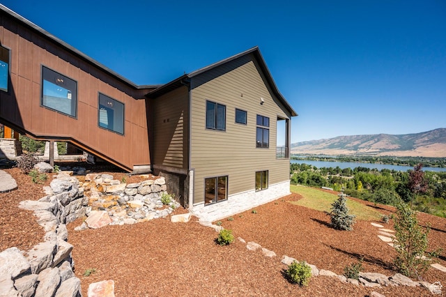6736 E Via Cortina, Huntsville, UT 84317 - view of side of home with a water and mountain view