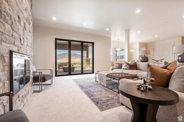 6736 E Via Cortina, Huntsville, UT 84317 - living room featuring a mountain view and light colored carpet