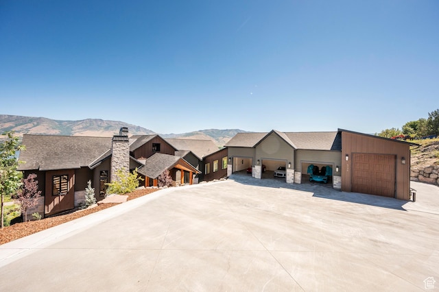 6736 E Via Cortina, Huntsville, UT 84317 - view of front of property featuring a mountain view and a garage