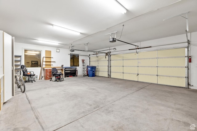 garage featuring a garage door opener