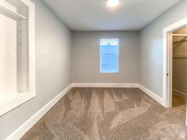 unfurnished bedroom with carpet