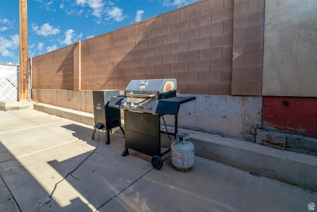 view of patio with a grill
