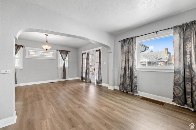 845 Binford St, Ogden, UT 84401 - unfurnished room with hardwood / wood-style floors and a textured ceiling