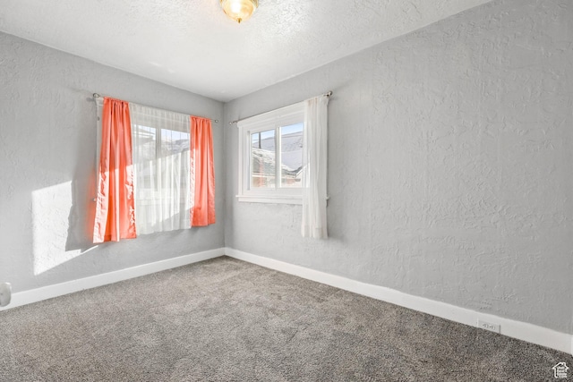 845 Binford St, Ogden, UT 84401 - carpeted empty room with a textured ceiling